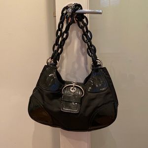 Black vintage Prada nylon bag with leather details, logo on the side